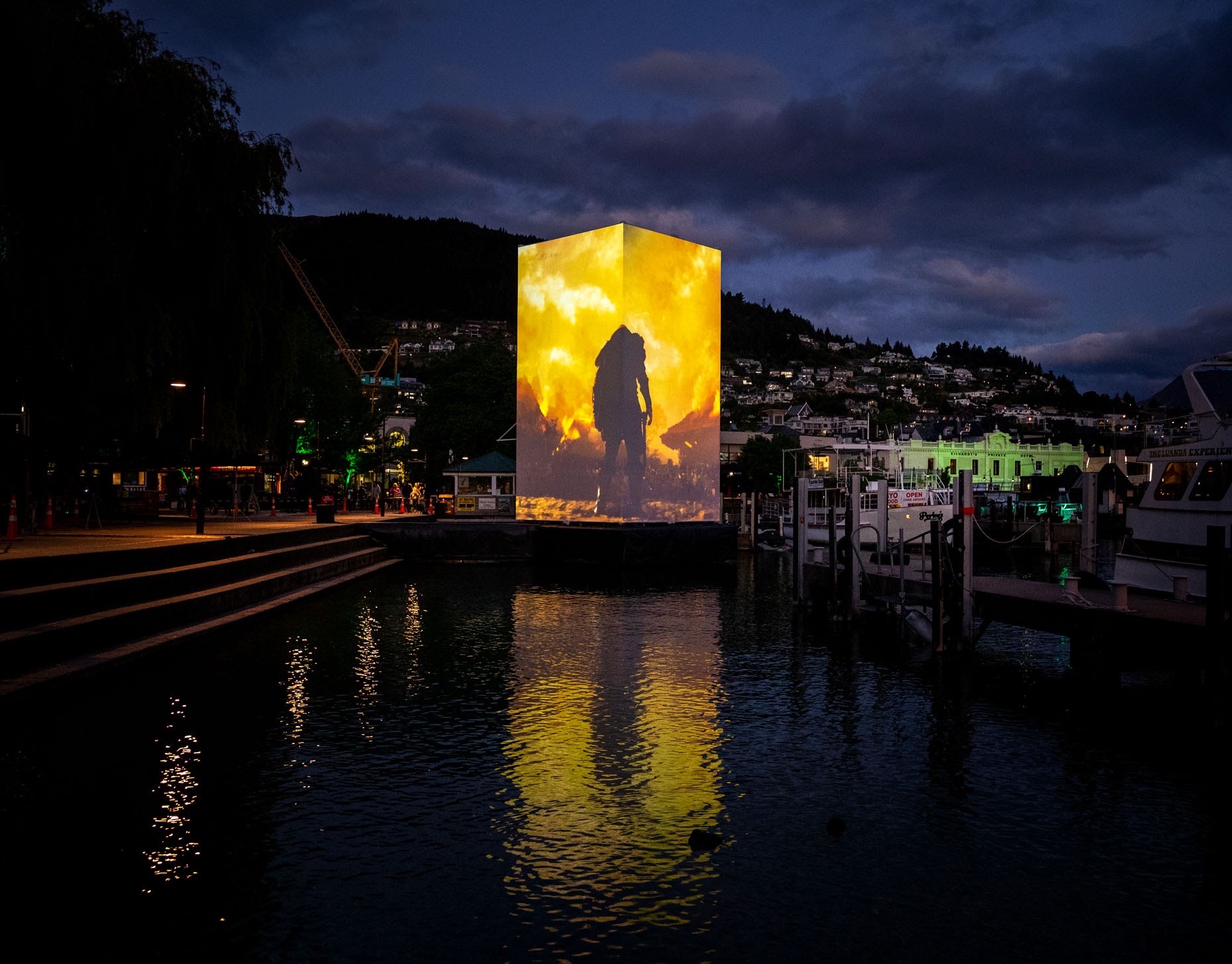 X-Box projection installation at dusk in Queenstown — LUMA